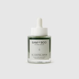  Oil control serum in a glass bottle with a dropper. The serum is a light green color and the bottle has the brand name "Bam Boo" printed on it.