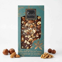 Premium milk chocolate bar with a mix of nuts, including almonds, hazelnuts, and cashews. The chocolate has a rich, creamy texture and a delightful blend of flavors from the various nuts.