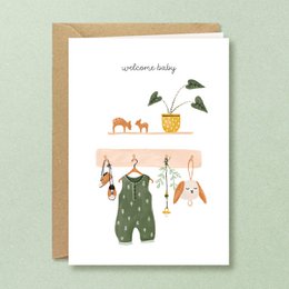 The image shows a greeting card with illustrations of baby clothes and accessories, including a romper, plants, and animal motifs. The text on the card says "Welcome Little One" in both English and Dutch. The description for this product could be:

"Welcome Little One greeting card featuring illustrations of a baby romper, plants, and animal motifs. Available in English and Dutch language versions. Suitable for welcoming a new baby."