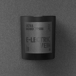 Small, scented electric vein candle with a minimalist black and white design.