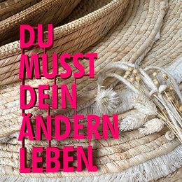A woven basket with a text overlay that reads "Du musst den anderen leben" (You must live for others).