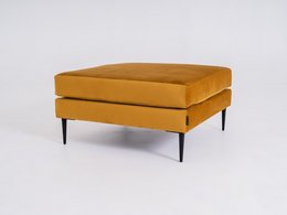 Mustard yellow square pouf with black metal legs. Comfortable and stylish footstool for living room or bedroom.