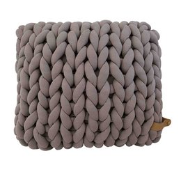 Oversized, coarse-knit cotton cushion in a taupe color. Chunky, textured design with a soft, plush feel.