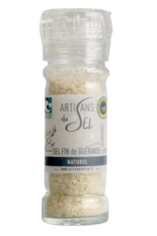 A natural fine Guérande salt mill for seasoning. The salt mill features a clear glass body and a wooden top, allowing you to easily see and control the amount of salt dispensed.