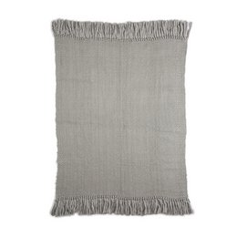 A decorative gray pillow with a fringed edge, suitable for a child's room.