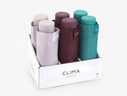  Compact, lightweight, and windproof folding umbrella in vibrant colors - pink, turquoise, and lime green. Provides UV50+ protection and is easy to carry with a wrist strap.