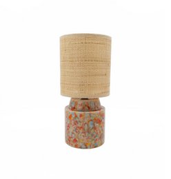  Tall, cylindrical ceramic lamp with a raffia shade and a textured, brown and blue base.