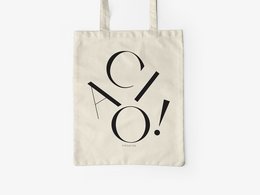 Cream-colored cotton tote bag with bold black text "CIAO!" printed on the front. Durable and reusable shopping bag for everyday use.