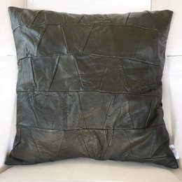 Olive green genuine leather cushion cover with a textured, geometric pattern.