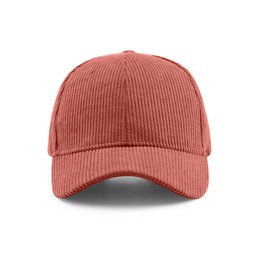 A pink corduroy baseball cap with a simple, classic design. The cap features a structured crown and an adjustable strap closure for a comfortable fit.