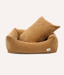  Mustard corduroy dog bed, snozy. Soft, cozy, and comfortable dog bed in a mustard corduroy material. Available in multiple sizes to fit small, medium, and large dogs.