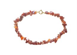  Chunky red agate stone necklace with gold-tone clasp and accents.