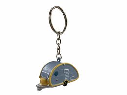 Retro-style keyring in the shape of a caravan, featuring a gray and yellow color scheme.