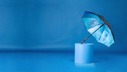Straight art umbrella with a vibrant blue and teal color scheme, featuring a unique abstract pattern design.
