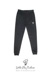 Black sweatpants for kids, featuring a comfortable and casual design with an elastic waistband and cuffs. Suitable for everyday wear or athletic activities.