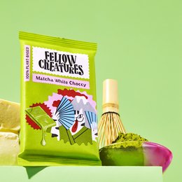 Matcha white chocolate snack bar with a vibrant, colorful package design featuring abstract shapes and patterns.