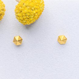 Gold-plated stud earrings with a simple, geometric design. The earrings feature a square-shaped, gold-plated stud with a minimalist, modern style.