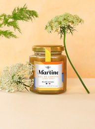  Carrot-infused honey with a vibrant orange color and a sweet, earthy flavor.