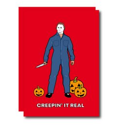 A Halloween greeting card featuring a character in a blue jumpsuit holding two jack-o'-lanterns against a bright red background with the text "Creepin' It Real".
