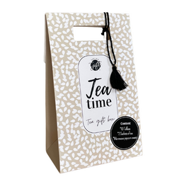 A gift box containing various tea-related items, including a tea bag, a tea cup, and a tea-themed gift tag. The box has a geometric pattern design and the text "tea time" printed on it.
