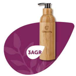 Adaptogen 3AGR stress relief body lotion in a bamboo bottle with a pump dispenser, accompanied by a natural sponge and other bath accessories.