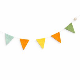  Colorful fabric bunting flags in various shades of gray, white, and orange. Wooden toy race car in red color on a wooden surface.