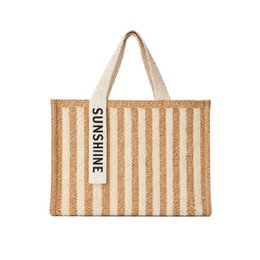  Beige and gold striped tote bag with "Sunshine" text. Made of durable canvas material with a sturdy rope handle for comfortable carrying.
