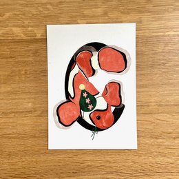 Colorful illustration of a clownfish on a greeting card. The card features a vibrant, abstract design with shades of red, orange, and black.