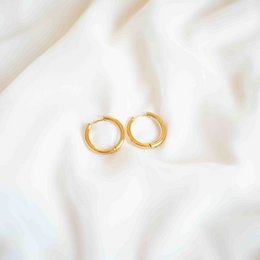  Gold-tone hoop earrings in small, medium, and large sizes.