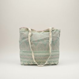  Cream canvas shoulder bag with geometric tribal pattern, rope handles, spacious tote style.