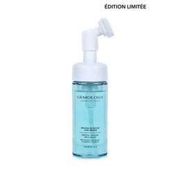 A green-colored cleansing spray bottle with a white pump dispenser. The product is described as "Rock moss with brush" and is categorized as a Cleanser.

The key details that can be extracted from the image and product information are:

Color: Green
Material: Plastic
Style: Spray bottle
Shape: Cylindrical
Product Type: Cleanser
Description: Rock moss with brush

This description provides enough information to enable semantic search for products related to cleansers, particularly those with a green, moss-like appearance and a brush-like applicator.