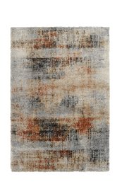  Rectangular area rug with abstract geometric patterns in neutral tones of beige, gray, and brown.
