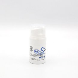 A 50 ml hand sanitizer bottle with a white label featuring a blue floral design. The bottle has a pump dispenser.