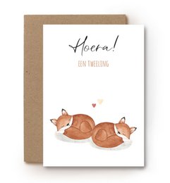 Adorable baby card featuring sleeping fox cubs with the text "Hooray! New Twins" in a handwritten style.