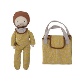  A brown cotton doll with a yellow floral print outfit and a matching yellow floral print tote bag.