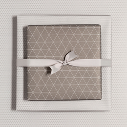 Sustainable brown wrapping paper with a triangular pattern, made from 100% recycled materials, suitable for men.