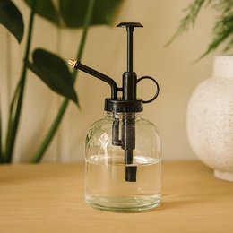  Transparent glass plant mister with black metal sprayer. Ideal for misting houseplants and succulents.