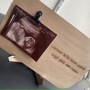 Bordje 'wanneer liefde leven wordt'