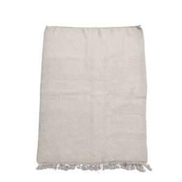 A large, rectangular, off-white Berber rug with a simple, minimalist design and fringed edges. The rug appears to be made of natural fibers and would be suitable for use in a variety of interior design styles.