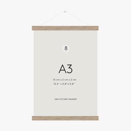 Oak picture hanger for A3 size frames, made of natural wood material with a simple, minimalist design.