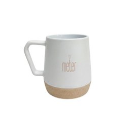 White ceramic mug with cork bottom, "meter" text, cylindrical shape, modern minimalist design