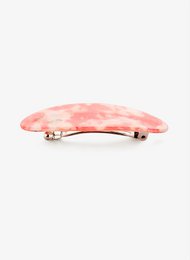 Multicolor light pink and white hair clip with a unique curved shape.