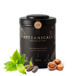 A black tea blend with Assam black tea, cocoa kernels, and hazelnut. The tea leaves are dark in color with visible cocoa kernels and hazelnut pieces.