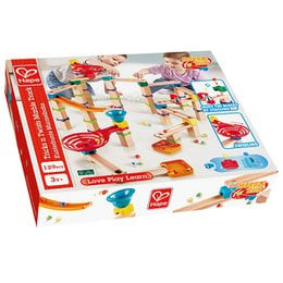 Colorful marble run toy set with various shapes and textures for creative play and building.