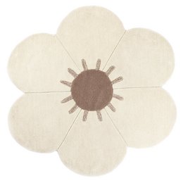 A round, white children's rug with a large daisy flower design in the center. The rug has a soft, plush texture and appears to be made of a natural fiber material.