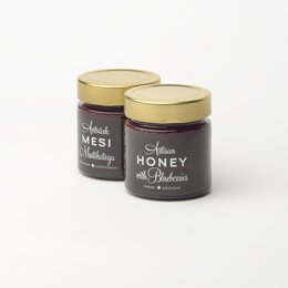 Honey with Blueberries - A sweet and flavorful honey infused with the natural sweetness of blueberries. Available in various sizes.