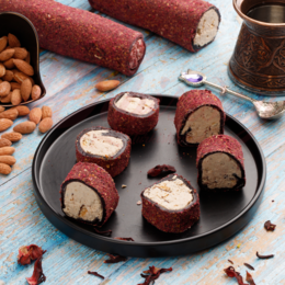  Red gummy candy rolls with a creamy filling, made with almonds and other ingredients.
