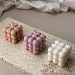 Set of 3 bubble candles in cream, beige, and old pink colors. Spherical, rounded shape with a textured, bubbly appearance. Made of wax material. Suitable for home decor, ambiance, and gifting.