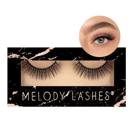 Dramatic, voluminous false eyelashes with a luxurious, glamorous look. Features a black and gold packaging design.