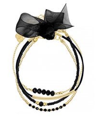A set of three elegant bracelets in gold, rose gold, and light silver tones, featuring a chic black and metallic design. The bracelets are made of beads and have a stylish, minimalist appearance.
